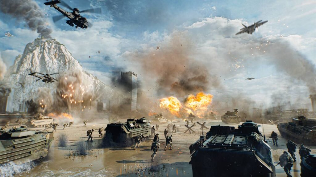 Epische Schlacht in Battlefield 6 – Panzer, Hubschrauber und Infanterie kämpfen auf einem weitläufigen Schlachtfeld, Explosionen und Rauch füllen den Himmel, während im Hintergrund Berge und zerstörte Gebäude zu sehen sind.