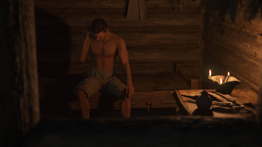 Henry sitzt erschöpft in einer Hütte in Kingdom Come: Deliverance II zu Beginn seines Abenteuers