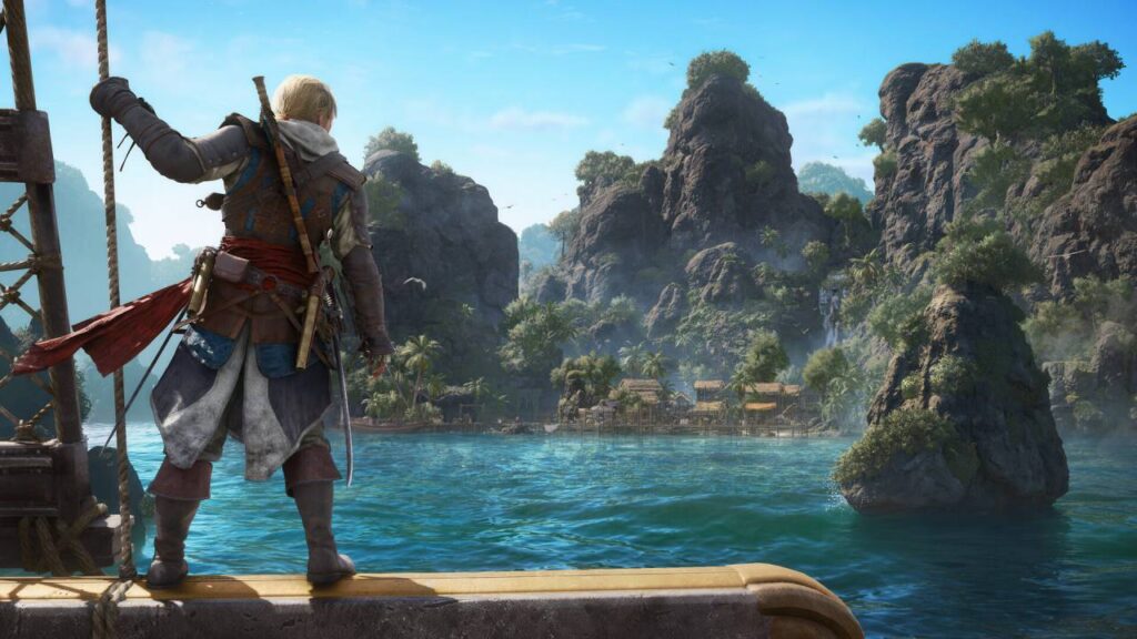 Assassin’s Creed Black Flag Resynced zeigt Edward Kenway vor einer tropischen Insel aus der Perspektive seines Schiffs
