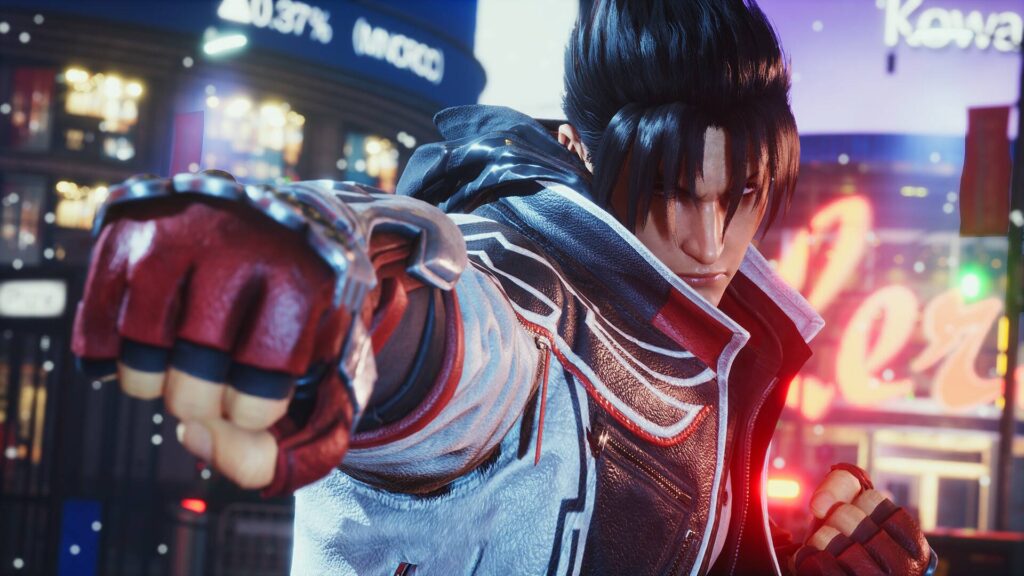 Jin Kazama aus Tekken 8 streckt kampfbereit seine Faust nach vorne, während im Hintergrund eine neonbeleuchtete Stadt zu sehen ist.