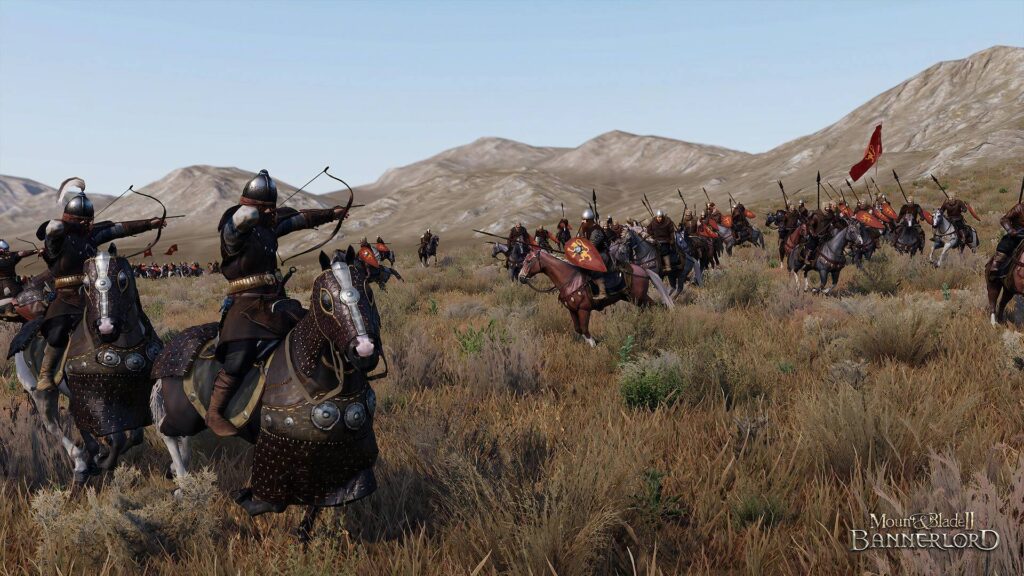 Mount & Blade 2: Bannerlord: Berittene Bogenschützen und Kavallerie auf einem mittelalterlichen Schlachtfeld.