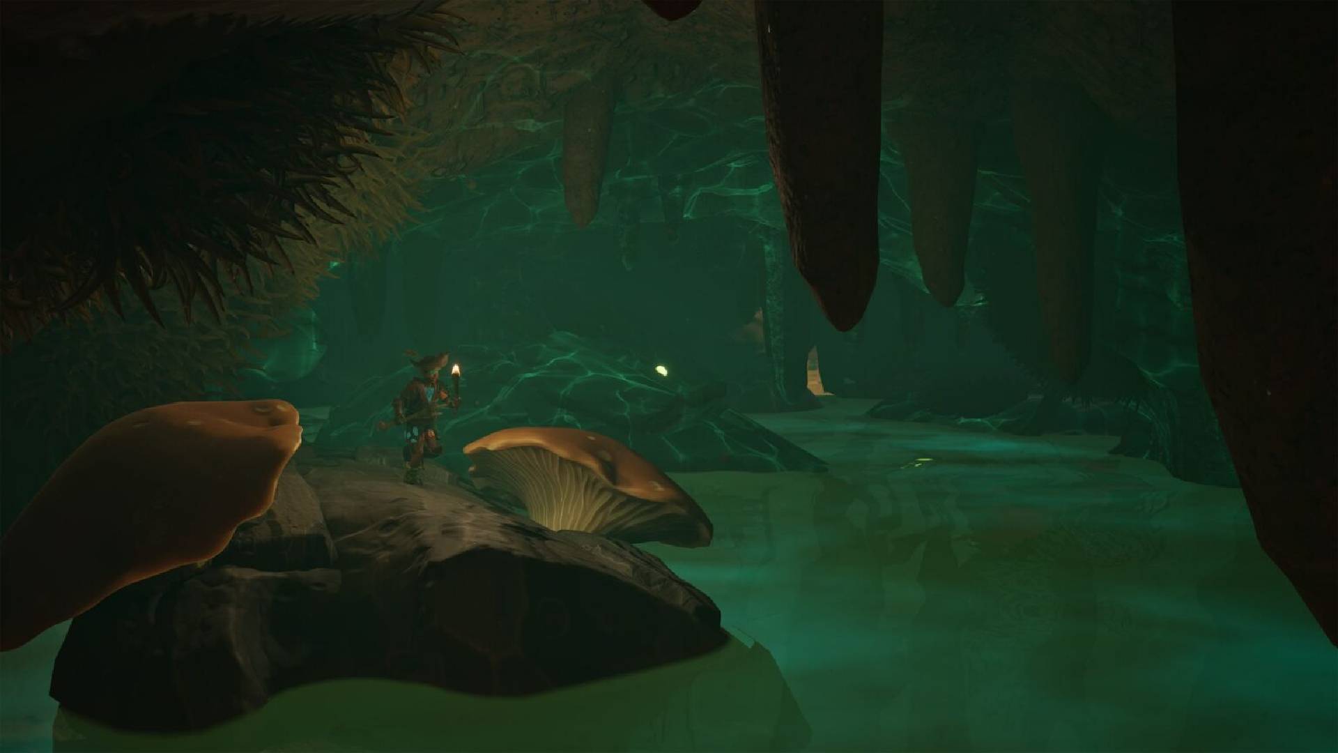 Grounded 2 Spieler erkundet mit einer Fackel eine dunkle Höhle im Abyss