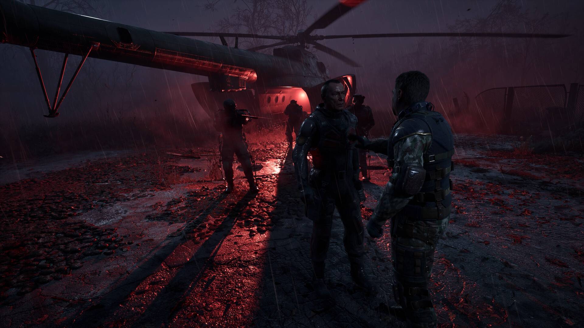 Stalker 2 Cost of Hope mit Stalkern vor einem Helikopter im Regen