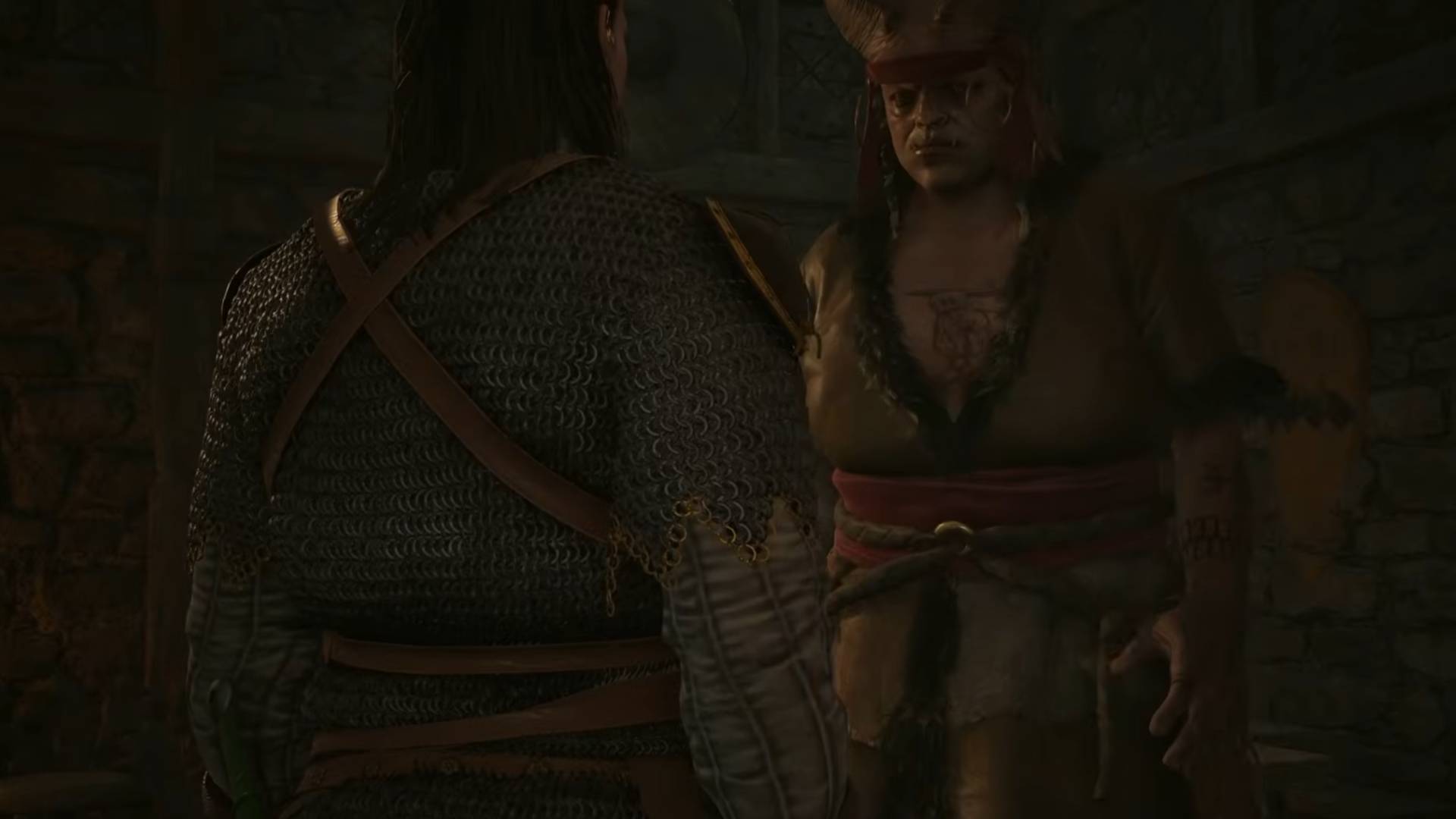 The Blood of Dawnwalker Coen im Gespräch mit Ocha in einem dunklen Gebäude