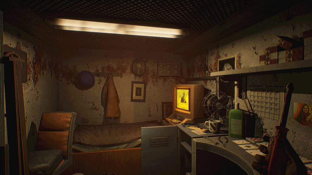 MOLE: Ein düsterer Schlaf- und Arbeitsraum im Inneren der Bohrmaschine mit Bett, altem Computer, Werkzeugen und flackernder Beleuchtung.