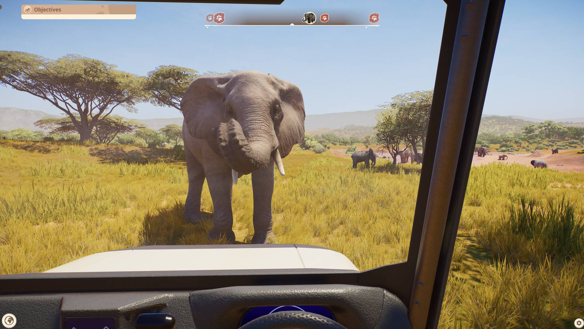 Elefant vor einem Safarifahrzeug in Planet Zoo 2