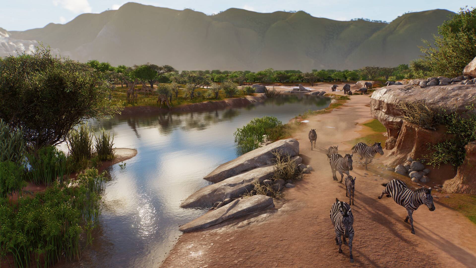 Zebras, Giraffen und Elefanten in Planet Zoo 2