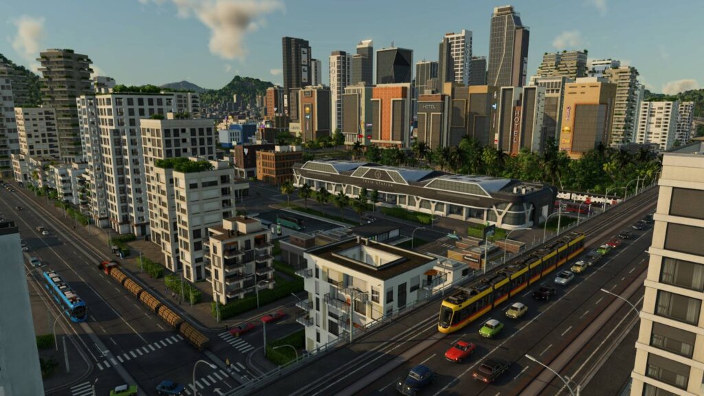 Transport Fever 3 dichter Stadtverkehr an mehreren Kreuzungen mit Straßenbahnen